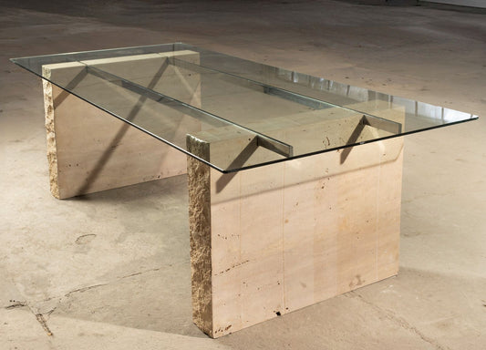 Mesa com tampo em vidro incolor de 10mm temperado com haste inox e os pés em travertino romano