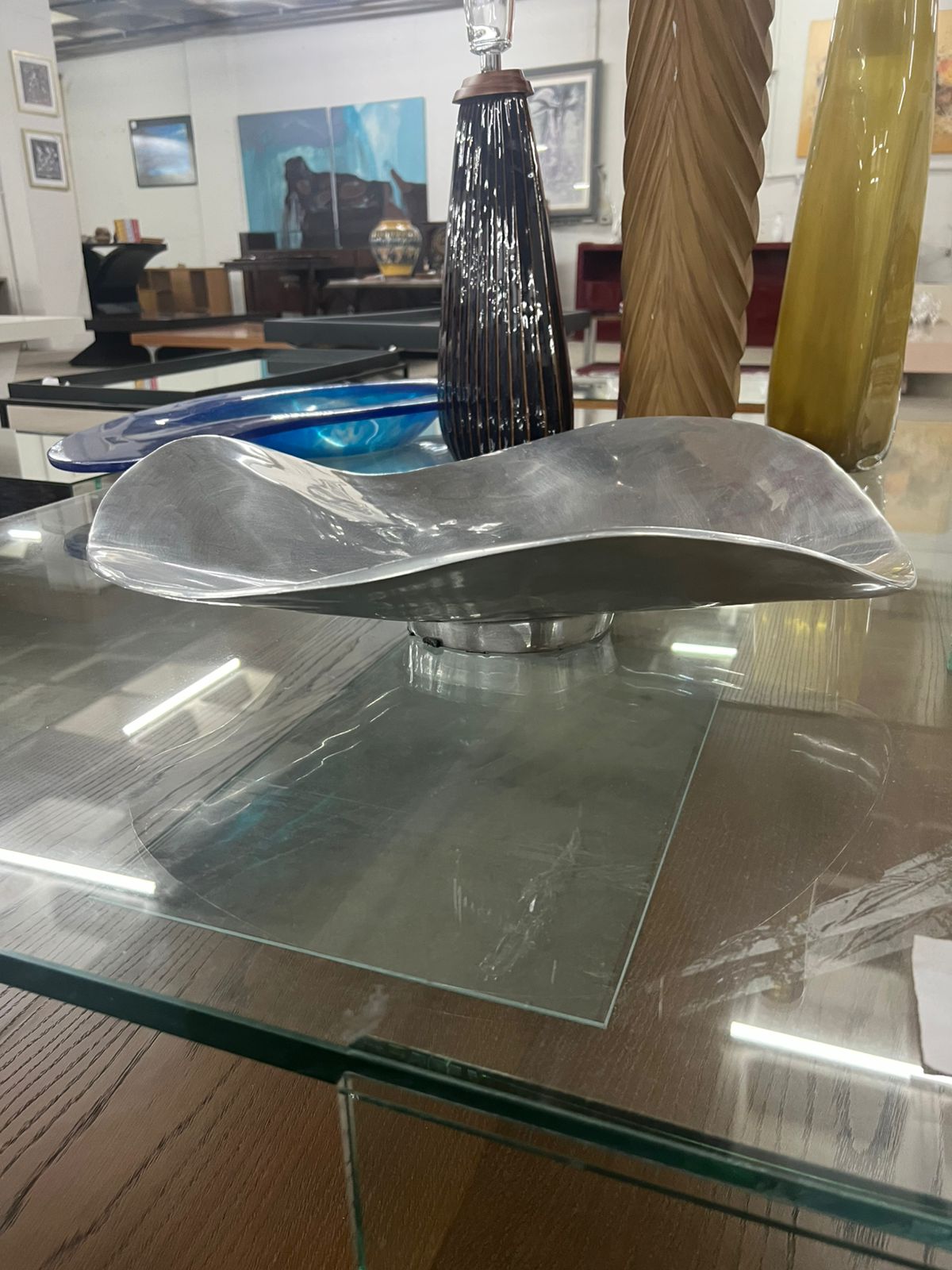 Centro de mesa de alumínio fundido (38%)